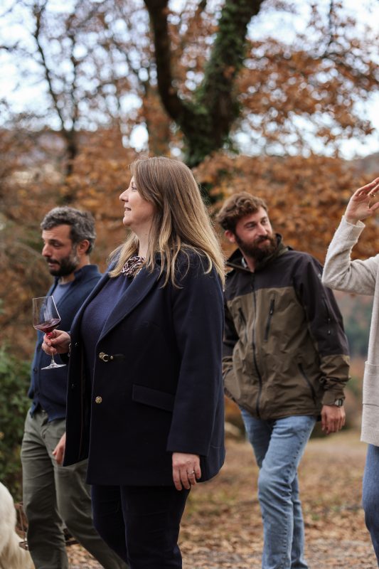 people enjoying wine